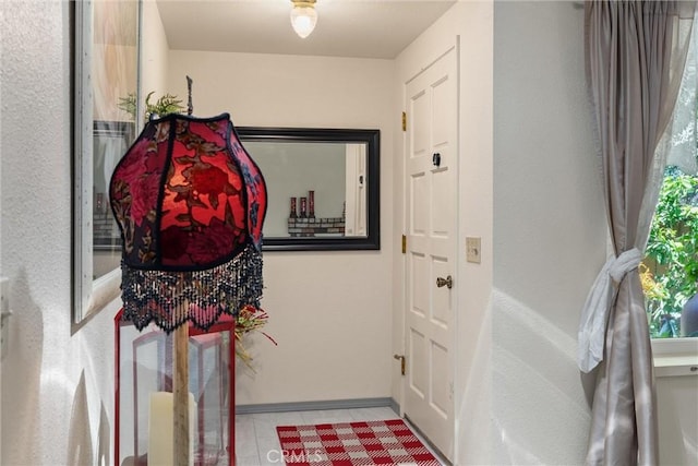 520 Wilshire Ct, Chico, CA 95973 - doorway to outside with tile patterned flooring and baseboards