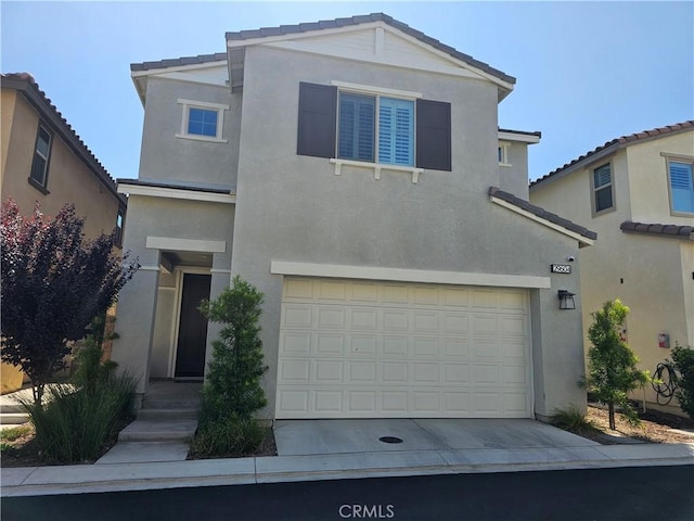 29604 Kyles Cir, Winchester, CA 92596 - view of front of property featuring stucco siding, a garage, and driveway