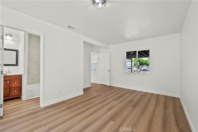 13612 Mercer St, Pacoima, CA 91331 - unfurnished room featuring light wood-style floors and baseboards