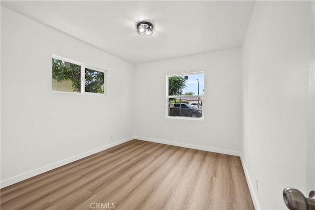 13612 Mercer St, Pacoima, CA 91331 - unfurnished room featuring light wood finished floors and baseboards