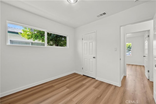 13612 Mercer St, Pacoima, CA 91331 - unfurnished bedroom with light wood finished floors