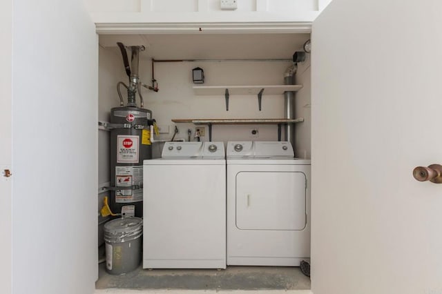 3755 N Vista Campana Unit 30, Oceanside, CA 92057 - laundry area with strapped water heater and washing machine and dryer