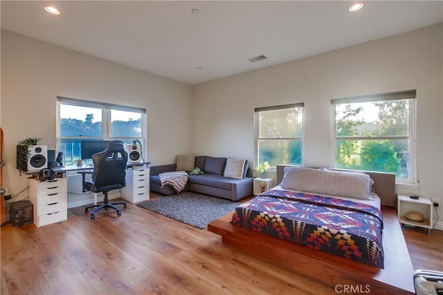 2424 Gird Rd, Fallbrook, CA 92028 - bedroom with a desk, multiple windows, wood finished floors, and recessed lighting