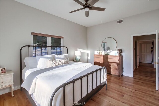 2424 Gird Rd, Fallbrook, CA 92028 - bedroom with light wood-style flooring and a ceiling fan
