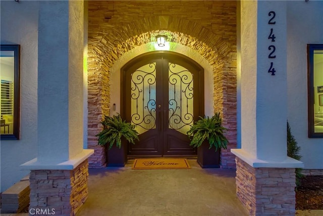 2424 Gird Rd, Fallbrook, CA 92028 - property entrance featuring french doors, stucco siding, and stone siding