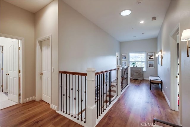 2424 Gird Rd, Fallbrook, CA 92028 - hall featuring wood finished floors, an upstairs landing, and recessed lighting