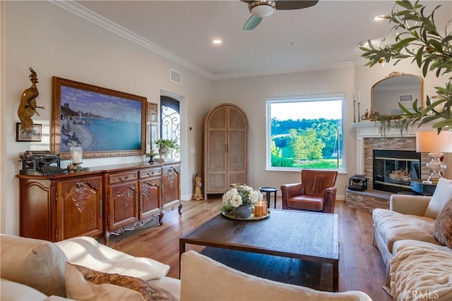 2424 Gird Rd, Fallbrook, CA 92028 - living area with ornamental molding, light wood-style floors, ceiling fan, a fireplace, and recessed lighting