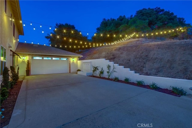 2424 Gird Rd, Fallbrook, CA 92028 - patio at twilight with driveway and a garage