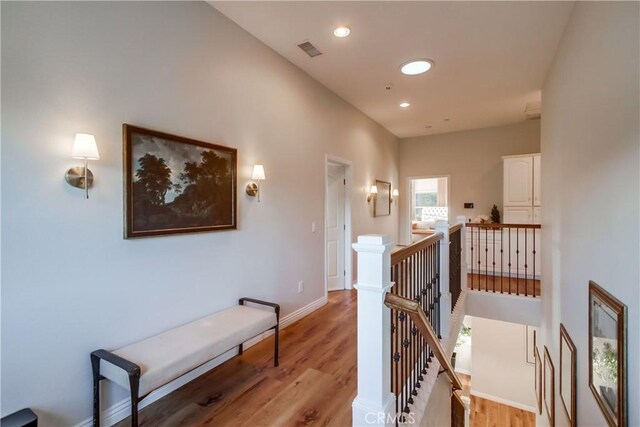 2424 Gird Rd, Fallbrook, CA 92028 - corridor featuring an upstairs landing, light wood-style flooring, and recessed lighting
