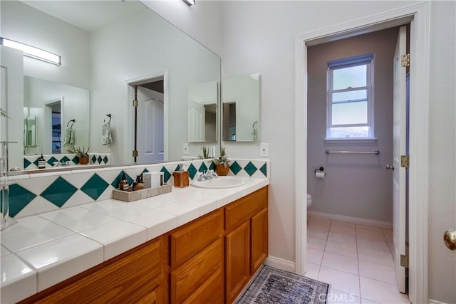 2424 Gird Rd, Fallbrook, CA 92028 - bathroom featuring vanity, tile patterned flooring, and tasteful backsplash