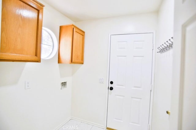 17076 E Cypress, Covina, CA 91722 - washroom with cabinet space and light tile patterned floors