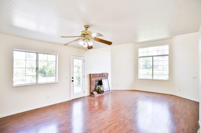 17076 E Cypress, Covina, CA 91722 - unfurnished living room featuring wood finished floors, ceiling fan, and a fireplace