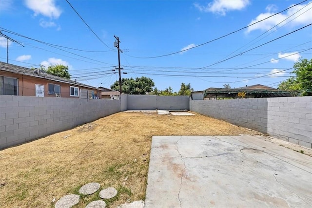 3900 Florence, Bell, CA 90201 - fenced backyard featuring a patio area