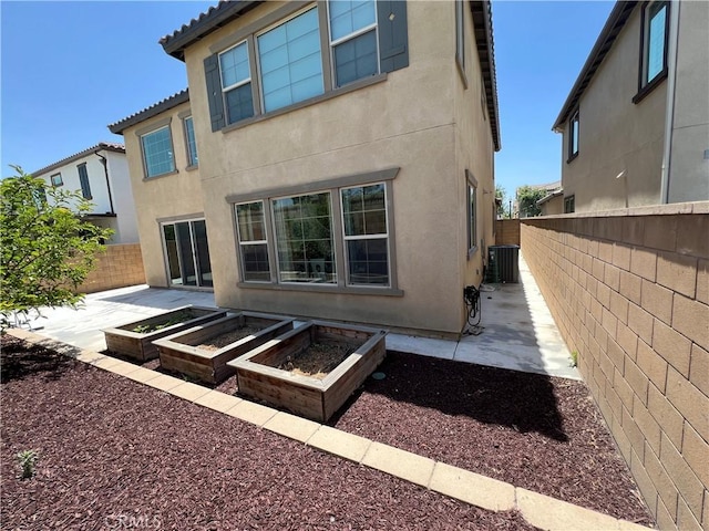 3071 E Silver Sky Dr, Ontario, CA 91762 - rear view of property with a patio area, stucco siding, a fenced backyard, and a tile roof