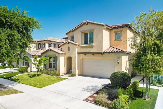 3071 E Silver Sky Dr, Ontario, CA 91762 - mediterranean / spanish-style home with a tile roof, stucco siding, a garage, concrete driveway, and a front yard