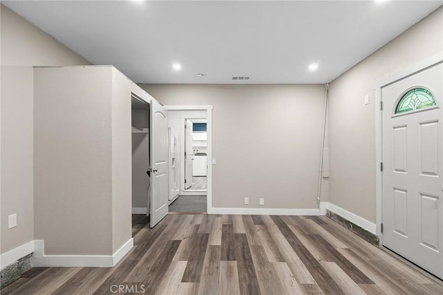1131 Stewart Ave, Chico, CA 95926 - entrance foyer with wood finished floors, recessed lighting, and washer / dryer