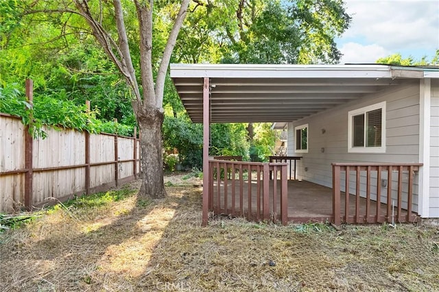 1131 Stewart Ave, Chico, CA 95926 - view of yard featuring a wooden deck and a carport