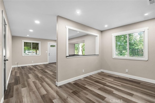 1131 Stewart Ave, Chico, CA 95926 - spare room featuring healthy amount of natural light, wood finished floors, and recessed lighting