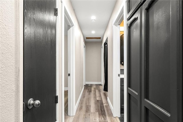 1131 Stewart Ave, Chico, CA 95926 - hallway featuring light wood finished floors and baseboards