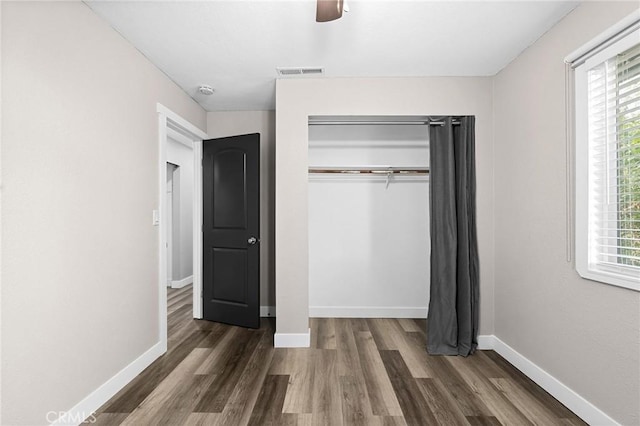 1131 Stewart Ave, Chico, CA 95926 - unfurnished bedroom with wood finished floors, a closet, and ceiling fan