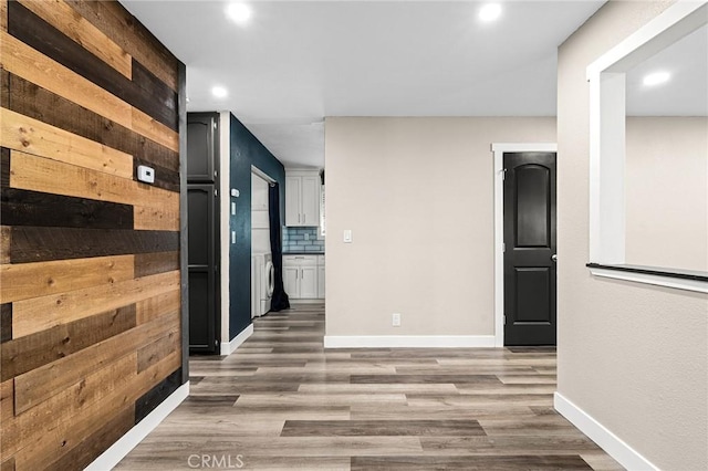 1131 Stewart Ave, Chico, CA 95926 - hallway with recessed lighting, wood finished floors, and washer / clothes dryer