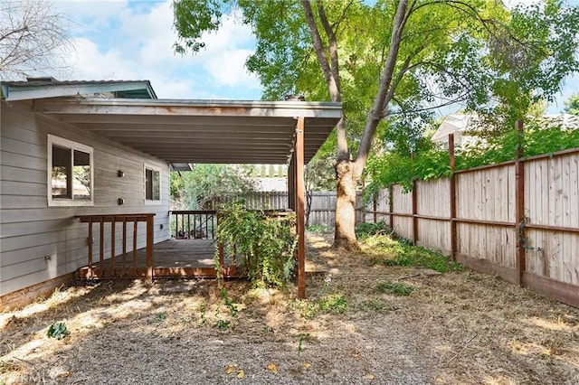 1131 Stewart Ave, Chico, CA 95926 - fenced backyard featuring a wooden deck