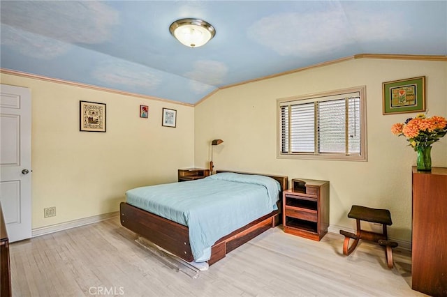 1323 Silvius Ave, San Pedro, CA 90731 - bedroom featuring vaulted ceiling and wood finished floors