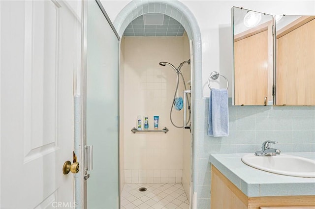 1323 Silvius Ave, San Pedro, CA 90731 - full bathroom featuring a stall shower, vanity, and tile walls