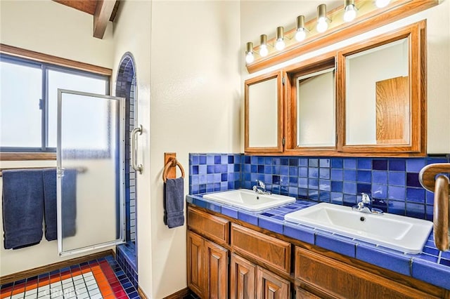1323 Silvius Ave, San Pedro, CA 90731 - bathroom with a stall shower, double vanity, beamed ceiling, and tasteful backsplash
