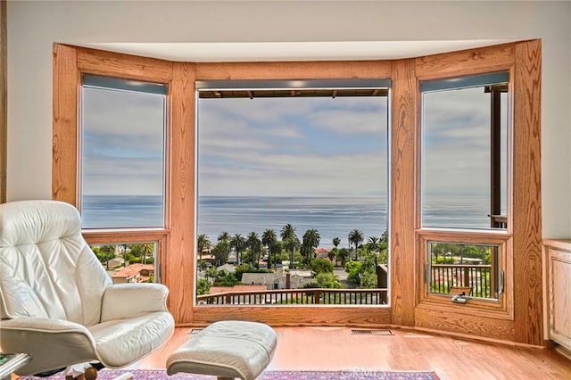 1323 Silvius Ave, San Pedro, CA 90731 - sitting room featuring a water view and wood finished floors