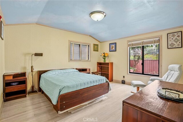 1323 Silvius Ave, San Pedro, CA 90731 - bedroom with vaulted ceiling and light wood-type flooring