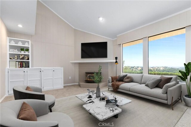 14220 El Monte Rd, Atascadero, CA 93422 - living room featuring vaulted ceiling, crown molding, carpet floors, and a fireplace with raised hearth