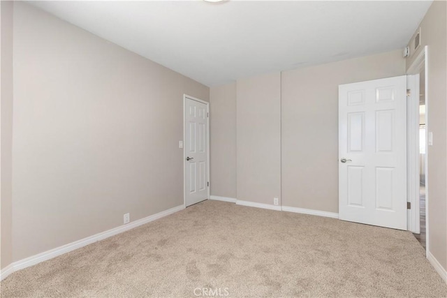 14220 El Monte Rd, Atascadero, CA 93422 - carpeted empty room featuring baseboards