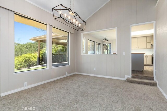 14220 El Monte Rd, Atascadero, CA 93422 - spare room with a chandelier, carpet flooring, vaulted ceiling, and crown molding