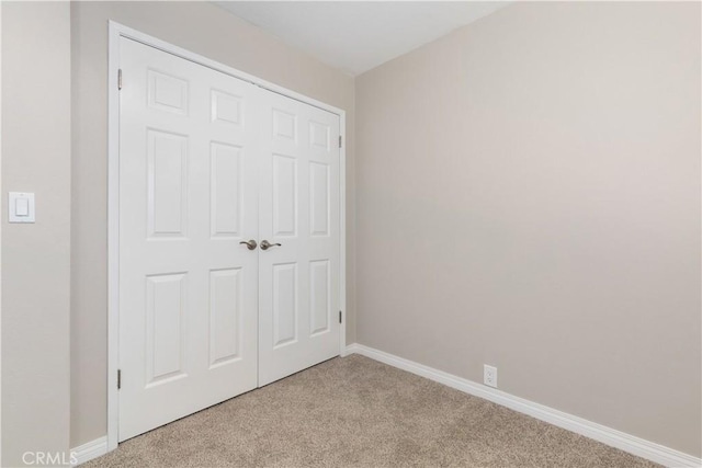 14220 El Monte Rd, Atascadero, CA 93422 - unfurnished bedroom featuring light carpet and a closet