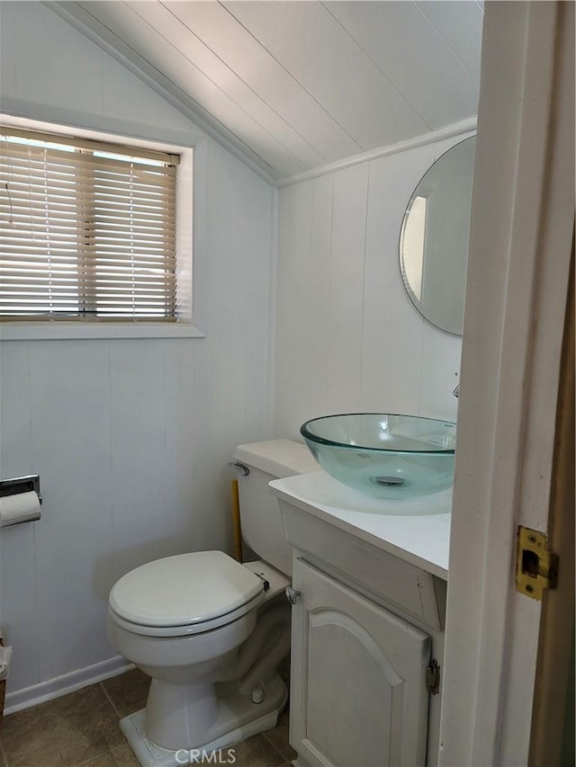 1004 Coldwater Dr, Frazier Park, CA 93225 - bathroom featuring lofted ceiling, vanity, and a decorative wall