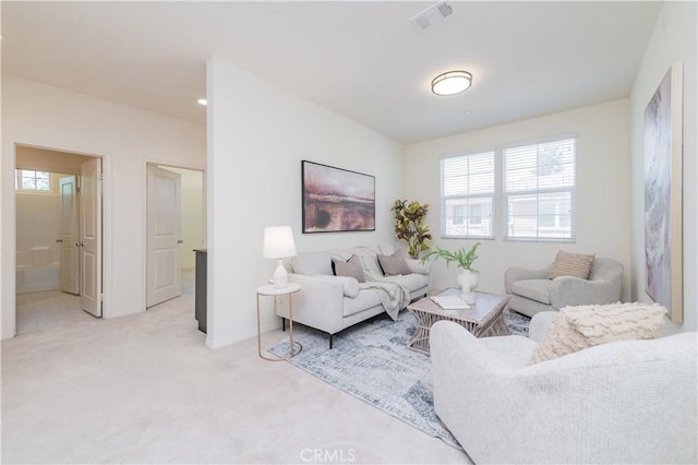 1504 Granada Rd, Upland, CA 91786 - living room featuring light colored carpet and baseboards