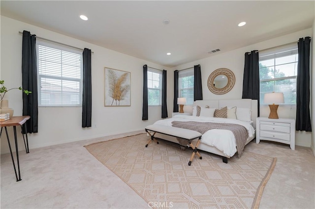 1504 Granada Rd, Upland, CA 91786 - bedroom featuring light carpet, multiple windows, and recessed lighting