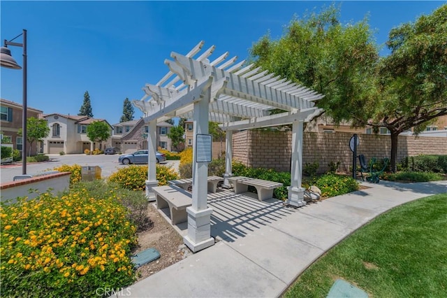 1504 Granada Rd, Upland, CA 91786 - view of patio featuring a pergola and a residential view