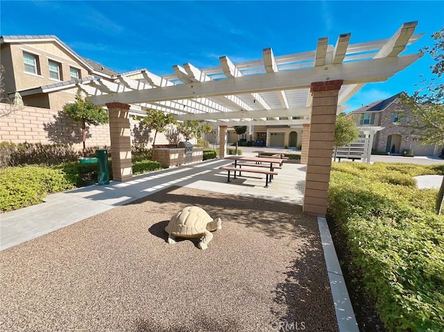 1504 Granada Rd, Upland, CA 91786 - view of home's community with a pergola