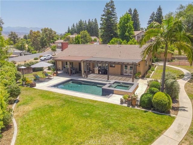 712 Buckingham Dr, Redlands, CA 92374 - view of swimming pool featuring a patio area, french doors, and a pool with connected hot tub