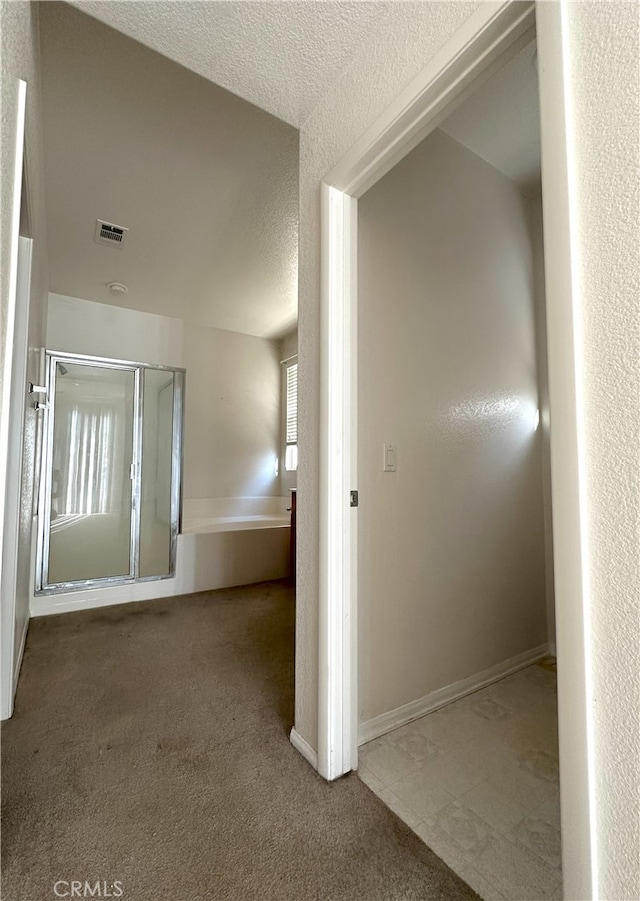 1256 Sunburst Dr, Beaumont, CA 92223 - corridor featuring carpet flooring and a textured ceiling