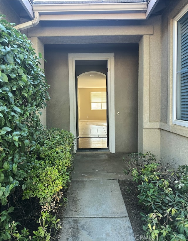 1256 Sunburst Dr, Beaumont, CA 92223 - property entrance featuring stucco siding