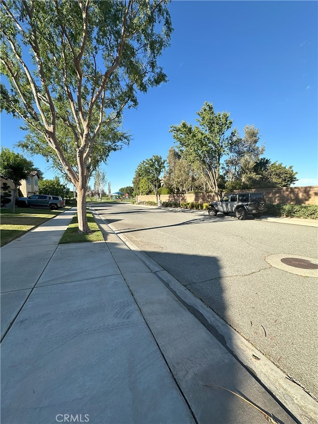 1256 Sunburst Dr, Beaumont, CA 92223 - view of asphalt street featuring sidewalks