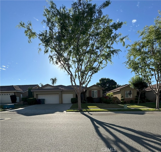 1256 Sunburst Dr, Beaumont, CA 92223 - ranch-style home featuring a garage and driveway