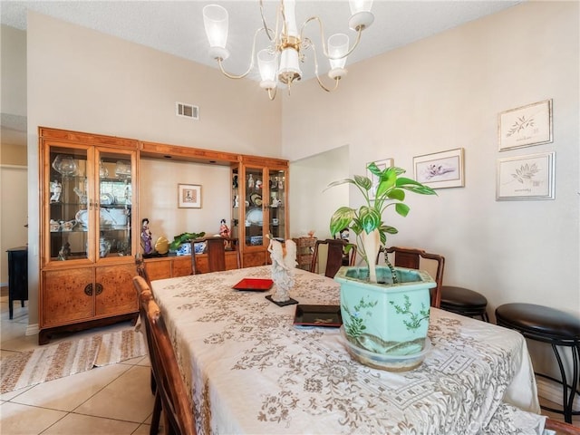 16873 Silica Dr, Victorville, CA 92395 - dining space with a chandelier and light tile patterned floors
