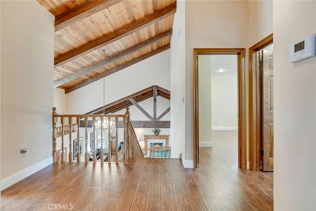 1013 Idaho Ct, Claremont, CA 91711 - hallway with a wooden ceiling with exposed beams, wood finished floors, and high vaulted ceiling