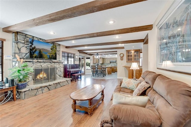 1013 Idaho Ct, Claremont, CA 91711 - living room featuring wood finished floors, a fireplace, a ceiling fan, beam ceiling, and recessed lighting