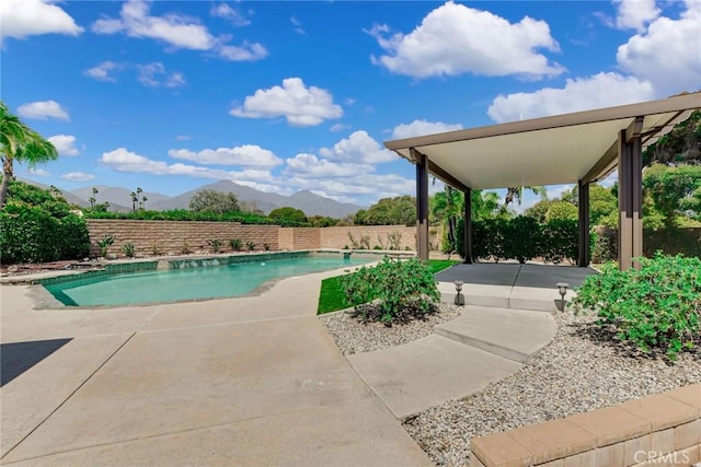 1013 Idaho Ct, Claremont, CA 91711 - view of pool featuring a mountain view, a patio area, and a fenced backyard