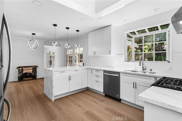 2610 Via Pacheco, Palos Verdes Estates, CA 90274 - kitchen with dishwasher, a peninsula, fridge, white cabinets, and light wood-style flooring